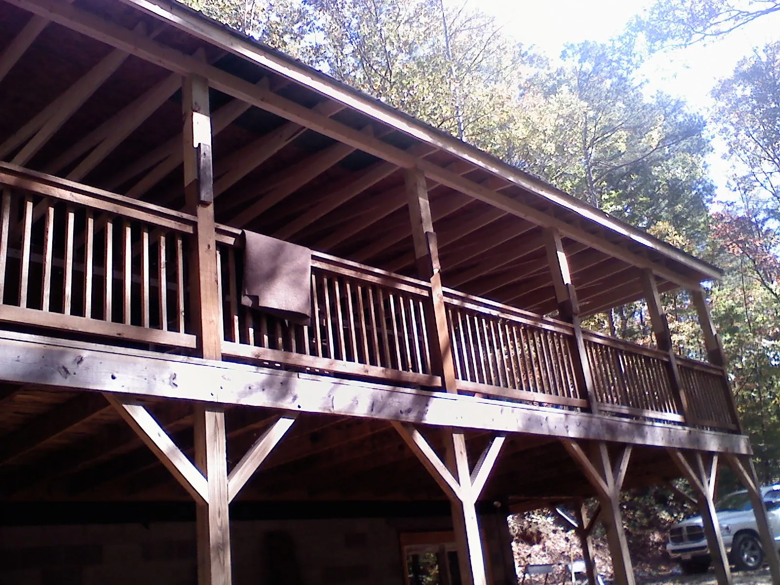 Timber framing under a new elevated porch and deck — Roof Leak Repair in Powell Butte by Roofing Brothers